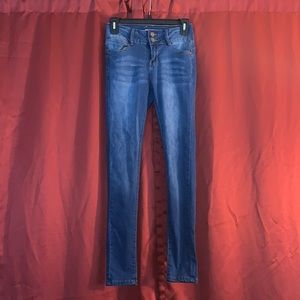 Blue medium wash skinny jeans
